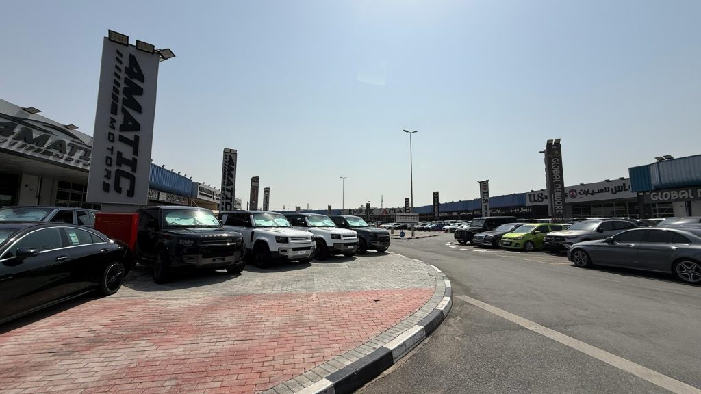 Car dealerships at Al Aweer Auto Market with rows of vehicles ready to export car from Dubai.